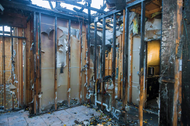 Professional Emergency Fire Damage Restoration technician working in Winsted, MN